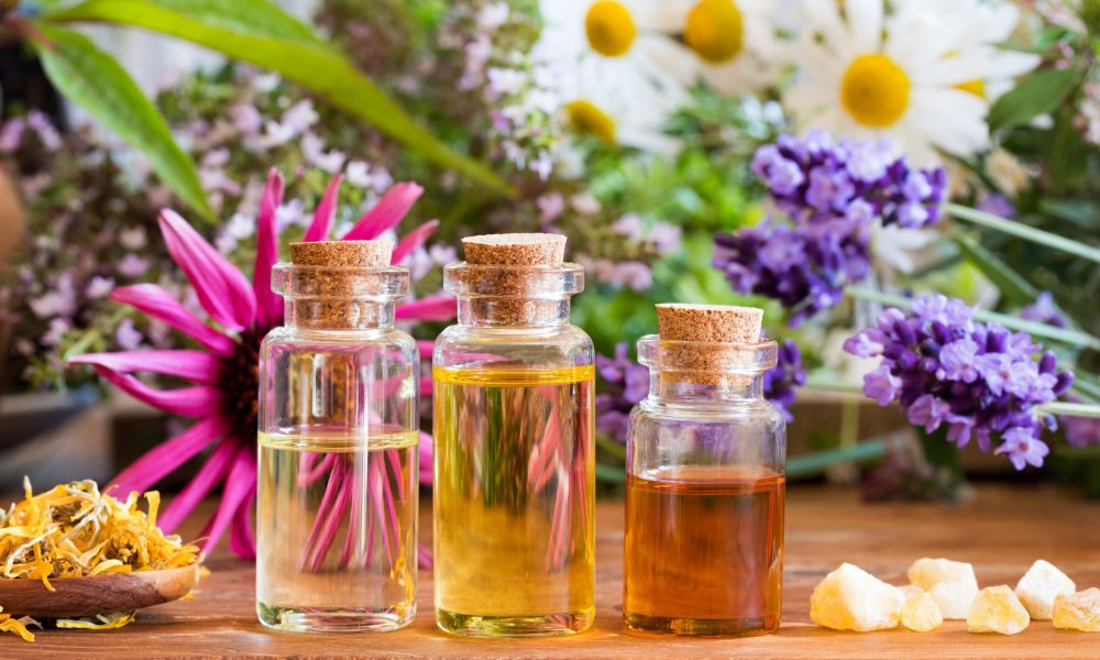 three bottles of essential oil with frankincense royalty free image 924418326 1558628847