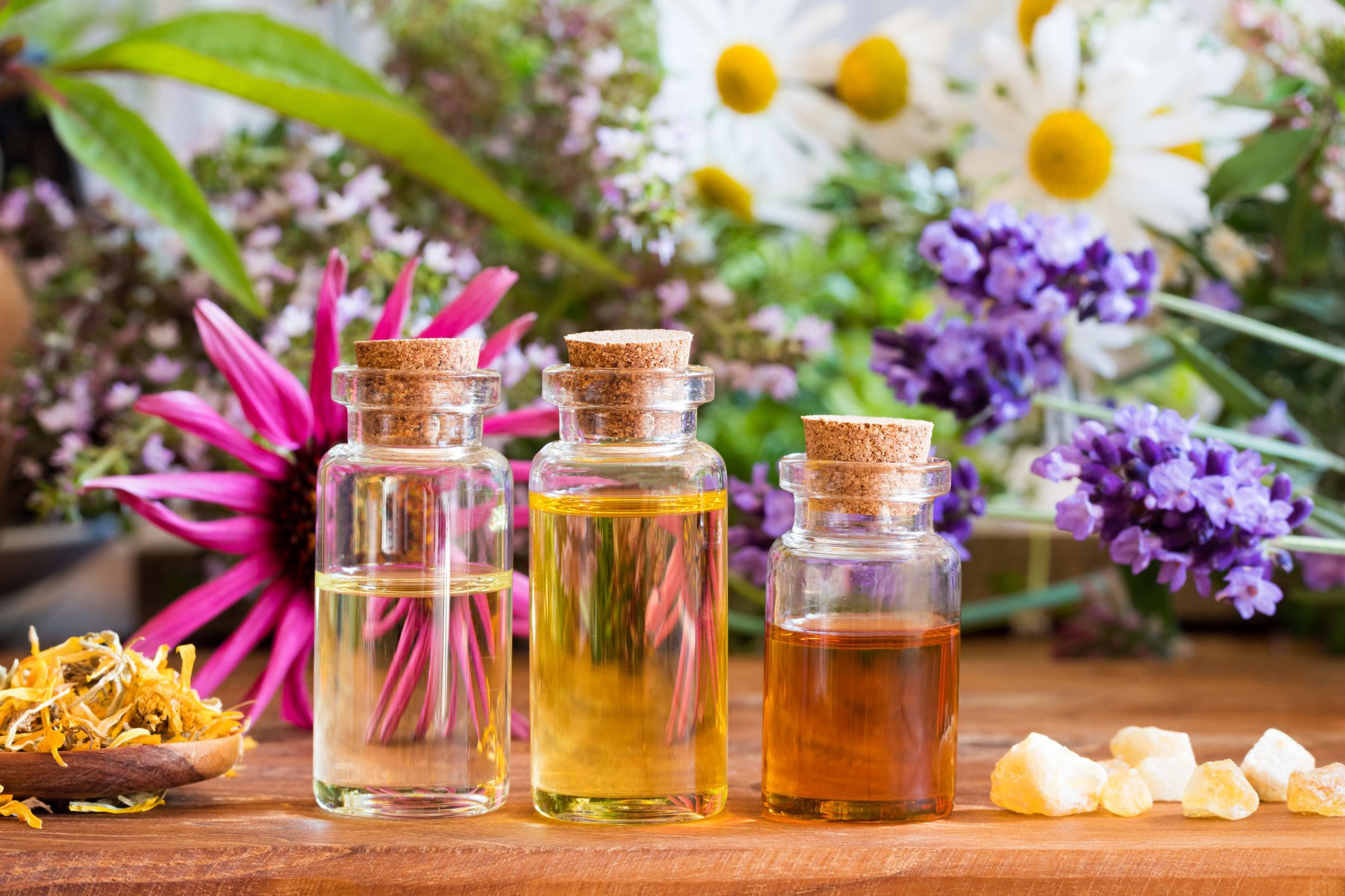 three bottles of essential oil with frankincense royalty free image 924418326 1558628847